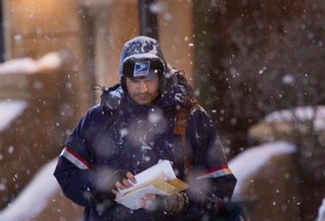 postal carrier in snow postal carrier in snow