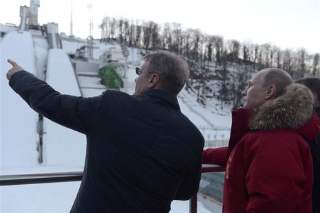 Russian President Vladimir Putin (R) and Sberbank President German Gref (L) visit Olympic venues near Sochi January 3, 2014. REUTERS/Alexei Russian President Vladimir Putin (R) and Sberbank President German Gref (L) visit Olympic venues near Sochi January 3, 2014. REUTERS/Alexei