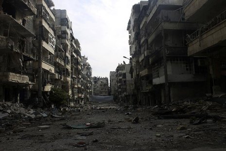 A damaged street is pictured in the Salah al-Din neighbourhood in central Aleppo December 25, 2013. REUTERS/Houssam Kattan A damaged street is pictured in the Salah al-Din neighbourhood in central Aleppo December 25, 2013. REUTERS/Houssam Kattan