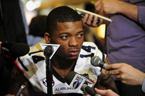 January 4, 2014; Newport Beach, CA, USA; Auburn Tigers quarterback Nick Marshall (14) speaks with media at the Newport Beach Marriott. Manda January 4, 2014; Newport Beach, CA, USA; Auburn Tigers quarterback Nick Marshall (14) speaks with media at the Newport Beach Marriott. Manda