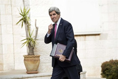U.S. Secretary of State John Kerry arrives for a meeting at the presidential compound in the West Bank city of Ramallah January 4, 2014. REU U.S. Secretary of State John Kerry arrives for a meeting at the presidential compound in the West Bank city of Ramallah January 4, 2014. REU