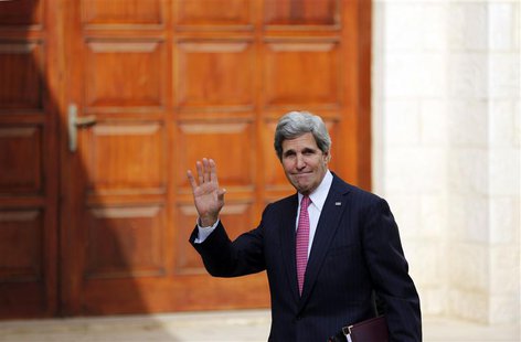 U.S. Secretary of State John Kerry waves upon arrival for a meeting with Palestinian President Mahmoud Abbas in the West Bank city of Ramall U.S. Secretary of State John Kerry waves upon arrival for a meeting with Palestinian President Mahmoud Abbas in the West Bank city of Ramall