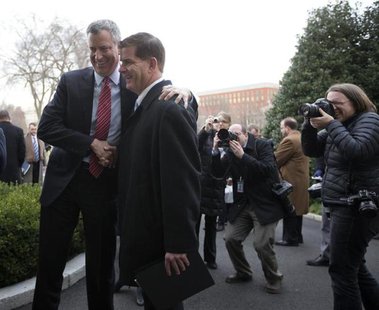 New York Mayor-elect Bill de Blasio (L) and Boston Mayor-elect Martin Walsh are pictured after speaking to the press outside the West Wing o New York Mayor-elect Bill de Blasio (L) and Boston Mayor-elect Martin Walsh are pictured after speaking to the press outside the West Wing o