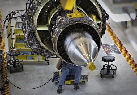 A worker carries out the final preparations on an engine for the Boeing 737-900 at their assembly operations in Renton, Washington, October A worker carries out the final preparations on an engine for the Boeing 737-900 at their assembly operations in Renton, Washington, October