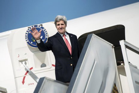 U.S. Secretary of State John Kerry waves as he boards his plane at Ben Gurion International Airport in Tel Aviv January 6, 2014. REUTERS/Bre U.S. Secretary of State John Kerry waves as he boards his plane at Ben Gurion International Airport in Tel Aviv January 6, 2014. REUTERS/Bre