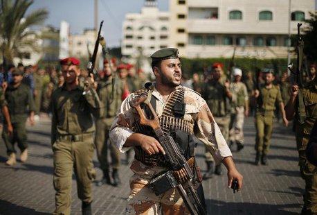 Members of Palestinian security forces loyal to Hamas march on a street in Gaza City. REUTERS/Suhaib Salem Members of Palestinian security forces loyal to Hamas march on a street in Gaza City. REUTERS/Suhaib Salem