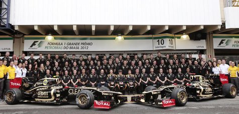 Lotus Formula One team pose during a photo call before the Brazilian F1 Grand Prix at Interlagos circuit in Sao Paulo November 25, 2012. REU Lotus Formula One team pose during a photo call before the Brazilian F1 Grand Prix at Interlagos circuit in Sao Paulo November 25, 2012. REU