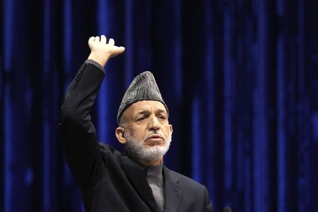 Afghan President Hamid Karzai speaks during the last day of the Loya Jirga, in Kabul November 24, 2013. REUTERS/Omar Sobhani Afghan President Hamid Karzai speaks during the last day of the Loya Jirga, in Kabul November 24, 2013. REUTERS/Omar Sobhani