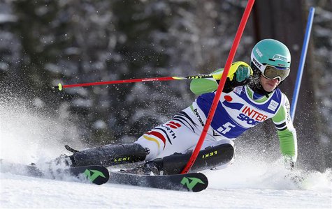 Felix Neureuther of Germany passes a pole during the first run of the World Cup Alpine skiing men's slalom race in Bormio, January 6, 2014. Felix Neureuther of Germany passes a pole during the first run of the World Cup Alpine skiing men's slalom race in Bormio, January 6, 2014.