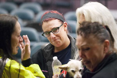 Union member Gabrielle Rogano (C) reacts with fellow union members after hearing that a union vote narrowly passed by 51% in support of Boei Union member Gabrielle Rogano (C) reacts with fellow union members after hearing that a union vote narrowly passed by 51% in support of Boei