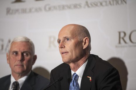 Governor Rick Scott (R-FL) answers a question during a news briefing at the 2013 Republican Governors Association conference in Scottsdale, Governor Rick Scott (R-FL) answers a question during a news briefing at the 2013 Republican Governors Association conference in Scottsdale,