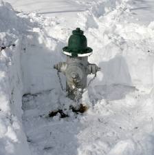 A fire hydrants dug out from the snow. A fire hydrants dug out from the snow.