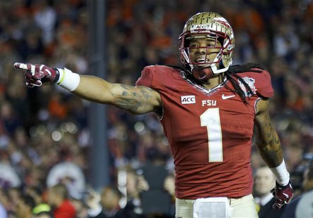 Florida State Seminoles Kelvin Benjamin celebrates after catching the game winning touchdown pass agasinst the Auburn Tigers in the fourth q Florida State Seminoles Kelvin Benjamin celebrates after catching the game winning touchdown pass agasinst the Auburn Tigers in the fourth q