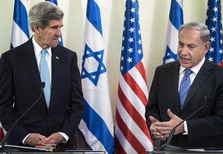 U.S. Secretary of State John Kerry listens as Israeli Prime Minister Benjamin Netanyahu makes a statement to the press before a meeting at t U.S. Secretary of State John Kerry listens as Israeli Prime Minister Benjamin Netanyahu makes a statement to the press before a meeting at t