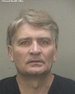 Former UBS banker Raoul Weil is seen in a booking photo after his arrival at the Broward Sheriff's Office in Fort Lauderdale, Florida, recei Former UBS banker Raoul Weil is seen in a booking photo after his arrival at the Broward Sheriff's Office in Fort Lauderdale, Florida, recei