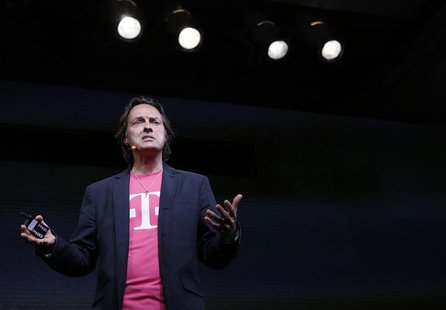 T-Mobile Chief Executive John Legere speaks during a company event in New York July 10, 2013. REUTERS/Brendan McDermid T-Mobile Chief Executive John Legere speaks during a company event in New York July 10, 2013. REUTERS/Brendan McDermid