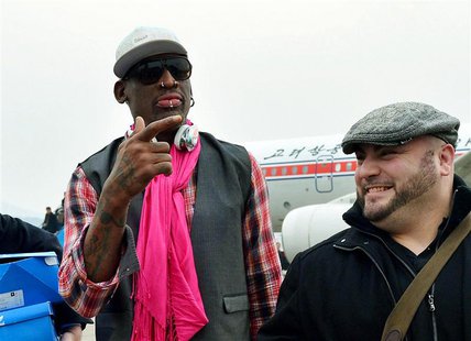 Former NBA basketball star Dennis Rodman (L) arrives at Pyongyang airport in Pyongyang, in this photo released by Kyodo January 6, 2014. REU Former NBA basketball star Dennis Rodman (L) arrives at Pyongyang airport in Pyongyang, in this photo released by Kyodo January 6, 2014. REU