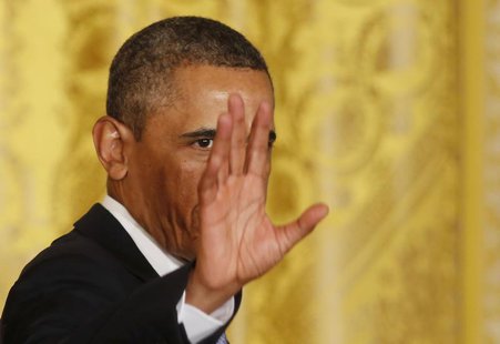 U.S. President Barack Obama waves after he urges Congress to act and extend emergency unemployment insurance benefits while at an event in t U.S. President Barack Obama waves after he urges Congress to act and extend emergency unemployment insurance benefits while at an event in t