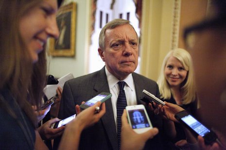 U.S. Senator Richard Durbin (D-IL) talks with reporters near the U.S. Senate floor at the U.S. Capitol during immigration debates in Washing U.S. Senator Richard Durbin (D-IL) talks with reporters near the U.S. Senate floor at the U.S. Capitol during immigration debates in Washing