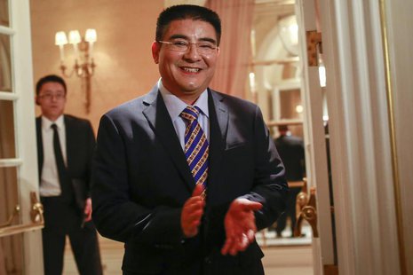 Chinese philanthropist Chen Guangbiao arrives at a news conference to announce his underwriting for the full surgical regimen of mother and Chinese philanthropist Chen Guangbiao arrives at a news conference to announce his underwriting for the full surgical regimen of mother and