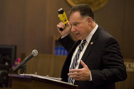 Orange County District Attorney Tony Rackauckas holds a stun gun during closing arguments in the trial of former Fullerton police officers J Orange County District Attorney Tony Rackauckas holds a stun gun during closing arguments in the trial of former Fullerton police officers J