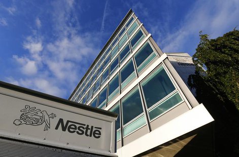 The Nestle logo is pictured on a truck outside the company's headquarters before the nine-month sale figures news conference in Vevey Octobe The Nestle logo is pictured on a truck outside the company's headquarters before the nine-month sale figures news conference in Vevey Octobe