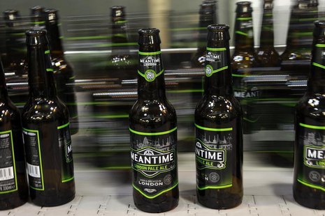 Beer bottles stand move on the production line at the Meantime brewery in east London May 10, 2012. REUTERS/Stefan Wermuth Beer bottles stand move on the production line at the Meantime brewery in east London May 10, 2012. REUTERS/Stefan Wermuth