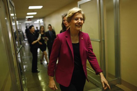 U.S. Senator Elizabeth Warren departs after the Senate passed a spending bill to avoid a government shutdown, sending the issue back to the U.S. Senator Elizabeth Warren departs after the Senate passed a spending bill to avoid a government shutdown, sending the issue back to the