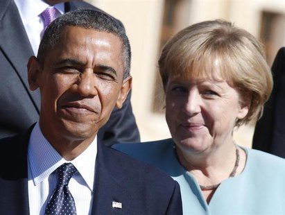 U.S. President Barack Obama and German Chancellor Angela Merkel arrive for the family picture event during the G20 summit in St.Petersburg S U.S. President Barack Obama and German Chancellor Angela Merkel arrive for the family picture event during the G20 summit in St.Petersburg S