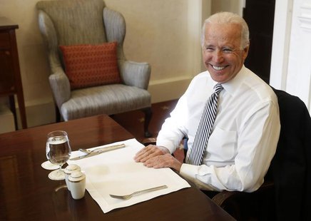 U.S. Vice President Joseph Biden sits across from U.S. President Barack Obama as they attend a private luncheon in Obama's private dining ro U.S. Vice President Joseph Biden sits across from U.S. President Barack Obama as they attend a private luncheon in Obama's private dining ro