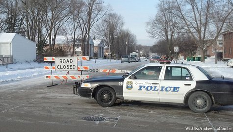 A Green Bay Police Dept. squad car is stationed at the intersection of S. Fisk St. and Capitol Dr. Dec. 16, 2013, near the scene where a police officer shot and killed a man. (Photo from: FOX 11) A Green Bay Police Dept. squad car is stationed at the intersection of S. Fisk St. and Capitol Dr. Dec. 16, 2013, near the scene where a police officer shot and killed a man. (Photo from: FOX 11)