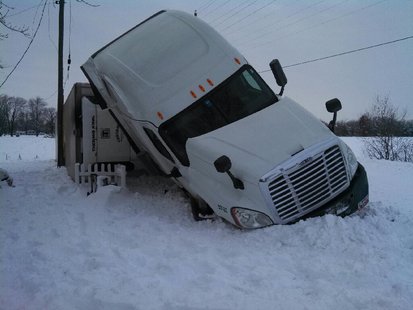 01-07-14 semi slides off road and overturns on SR42. photo provided by Vigo County Sheriff 01-07-14 semi slides off road and overturns on SR42. photo provided by Vigo County Sheriff