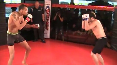 Darin Luttrell (left) fights in a match. Darin Luttrell (left) fights in a match.