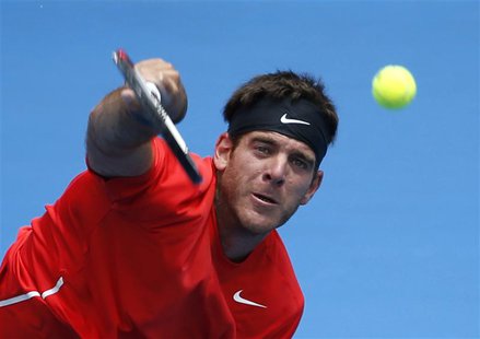 Juan Martin Del Potro of Argentina serves to Radek Stepanek of the Czech Republic during their men's singles quarter final match at the Sydn Juan Martin Del Potro of Argentina serves to Radek Stepanek of the Czech Republic during their men's singles quarter final match at the Sydn