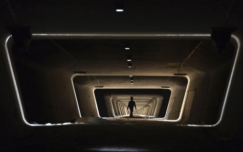 A worker walks in the foundation of a new railway line in Yiwu, Zhejiang province, May 21, 2013. REUTERS/China Daily A worker walks in the foundation of a new railway line in Yiwu, Zhejiang province, May 21, 2013. REUTERS/China Daily