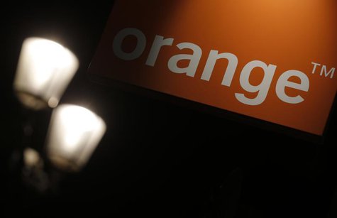 The logo of the Orange telecommunication and internet provider is seen on the facade of a store in Paris July 24, 2013. REUTERS/Christian Ha The logo of the Orange telecommunication and internet provider is seen on the facade of a store in Paris July 24, 2013. REUTERS/Christian Ha