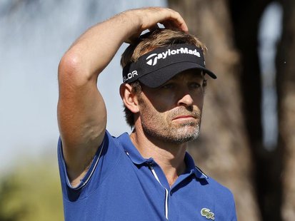 Raphael Jacquelin of France watches the ball after teeing off on the 5th hole during the final round of the inaugural Turkish Airlines Open Raphael Jacquelin of France watches the ball after teeing off on the 5th hole during the final round of the inaugural Turkish Airlines Open
