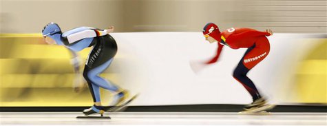Germany's Claudia Pechstein (L) skates to a second place finish against Czech Republic's Martina Sablikova in the Women's 5000m race at the Germany's Claudia Pechstein (L) skates to a second place finish against Czech Republic's Martina Sablikova in the Women's 5000m race at the