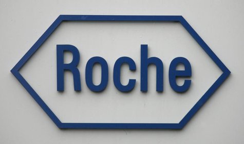 The logo of Swiss pharmaceutical company Roche is pictured on the company's headquarters in Basel February 4, 2009. REUTERS/Christian Hartma The logo of Swiss pharmaceutical company Roche is pictured on the company's headquarters in Basel February 4, 2009. REUTERS/Christian Hartma