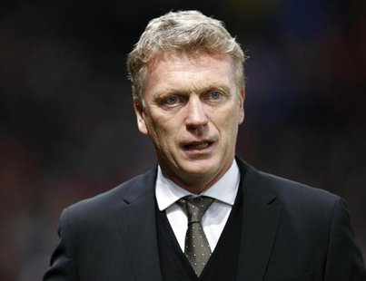 Manchester United manager David Moyes attends their English FA Cup soccer match against Swansea City at Old Trafford in Manchester, northern Manchester United manager David Moyes attends their English FA Cup soccer match against Swansea City at Old Trafford in Manchester, northern