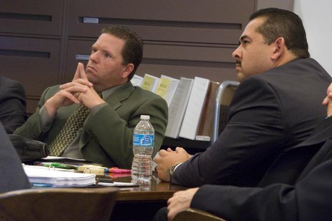 Former Fullerton police officers Jay Cicinelli (L), and Manuel Ramos (R) listen during the trial of Ramos and Cincinelli in Santa Ana, Calif Former Fullerton police officers Jay Cicinelli (L), and Manuel Ramos (R) listen during the trial of Ramos and Cincinelli in Santa Ana, Calif