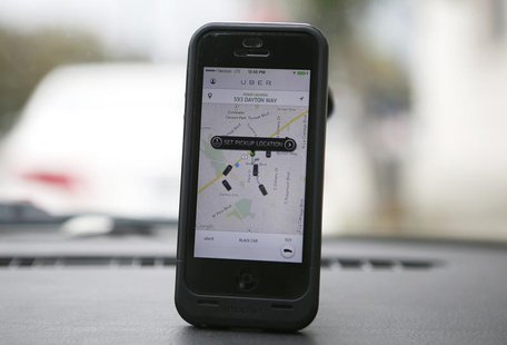 An Uber app is seen on an iPhone in Beverly Hills, California, December 19, 2013. REUTERS/Lucy Nicholson An Uber app is seen on an iPhone in Beverly Hills, California, December 19, 2013. REUTERS/Lucy Nicholson