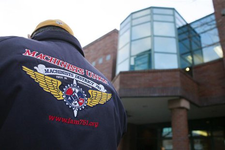 A union member stands outside of the International Association of Machinists and Aerospace Workers (IAM) District Lodge 751 headquarters dur A union member stands outside of the International Association of Machinists and Aerospace Workers (IAM) District Lodge 751 headquarters dur