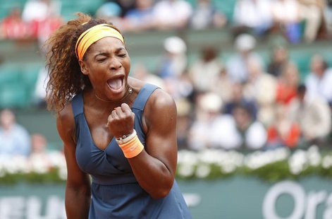 Serena Williams of the U.S. reacts during her women's singles match against Roberta Vinci of Italy at the French Open tennis tournament at t Serena Williams of the U.S. reacts during her women's singles match against Roberta Vinci of Italy at the French Open tennis tournament at t