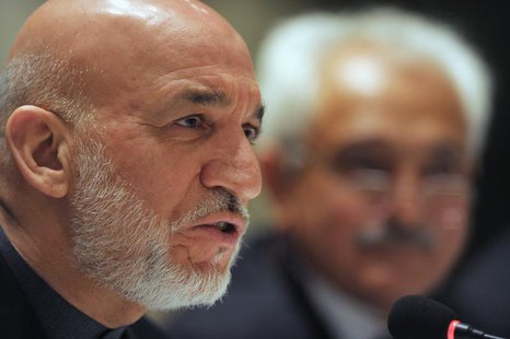 Afghanistan's President Hamid Karzai addresses media representatives during a press interaction in New Delhi December 14, 2013. REUTERS/Find Afghanistan's President Hamid Karzai addresses media representatives during a press interaction in New Delhi December 14, 2013. REUTERS/Find