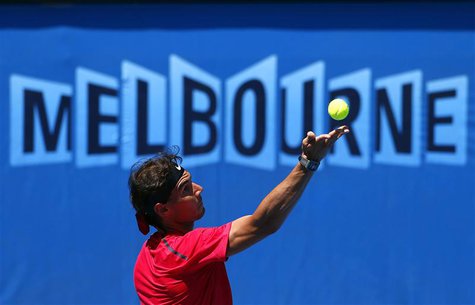 Spain's Rafael Nadal serves during a training session at Melbourne Park January 9, 2014. REUTERS/David Gray Spain's Rafael Nadal serves during a training session at Melbourne Park January 9, 2014. REUTERS/David Gray