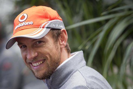 McLaren Formula One driver Jenson Button of Britain smiles while giving an interview at the Circuit of The Americas in Austin, Texas Novembe McLaren Formula One driver Jenson Button of Britain smiles while giving an interview at the Circuit of The Americas in Austin, Texas Novembe