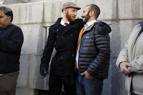 Plaintiffs Derek Kitchen, left, and his partner Moudi Sbeity stand outside the Frank E. Moss federal courthouse in Salt Lake City, Utah, Dec Plaintiffs Derek Kitchen, left, and his partner Moudi Sbeity stand outside the Frank E. Moss federal courthouse in Salt Lake City, Utah, Dec
