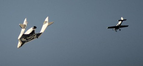 Virgin Galactic's SpaceShipTwo flies over the Mojave Desert in California in this file photo taken April 29, 2013 shortly before successfull Virgin Galactic's SpaceShipTwo flies over the Mojave Desert in California in this file photo taken April 29, 2013 shortly before successfull