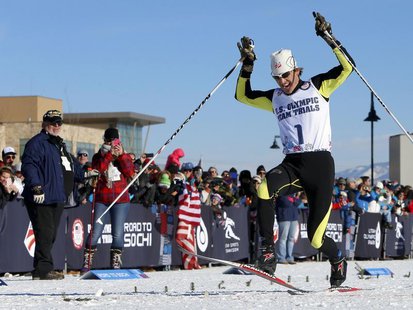 Todd Lodwick of the United States stamps on the finish line with his skis to come in first during the U.S. Olympic nordic combined trials at Todd Lodwick of the United States stamps on the finish line with his skis to come in first during the U.S. Olympic nordic combined trials at